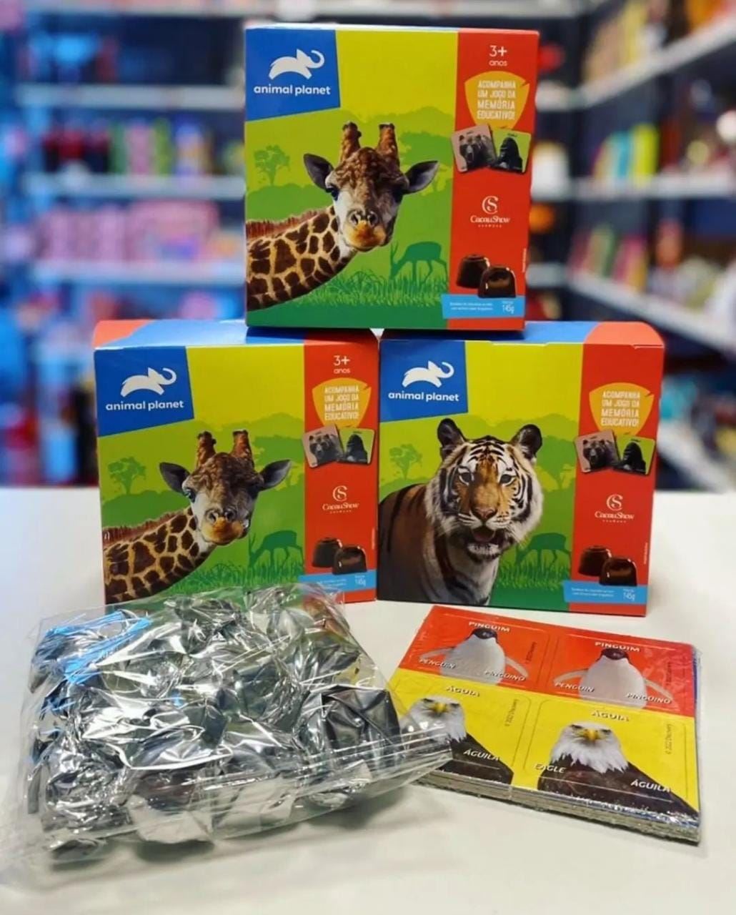 Cubo Animal Planet jogo da memória 145g.  Bombons de chocolate ao leite com recheio sabor brigadeiro.